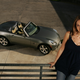 Illustration for article titled Jalopnik Question Of The Day: Is GM Designer Vicki Vlachakis Hotter Than The Pontiac Solstice?